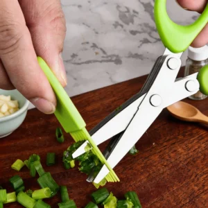 5-blade stainless steel kitchen scissors with bright green cleaning comb accessory displayed on wooden tabletop KL-SC-KT-003