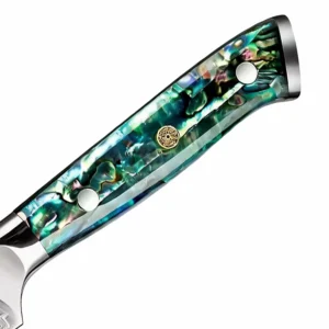 Close-up of iridescent green abalone shell knife handle with mosaic pin isolated on white background KL-KN-OS-003