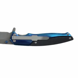 Close-up view of a folding knife handle with a stainless steel pocket clip and blue bolster isolated on white background. SKU: KL-OD-SS-006.