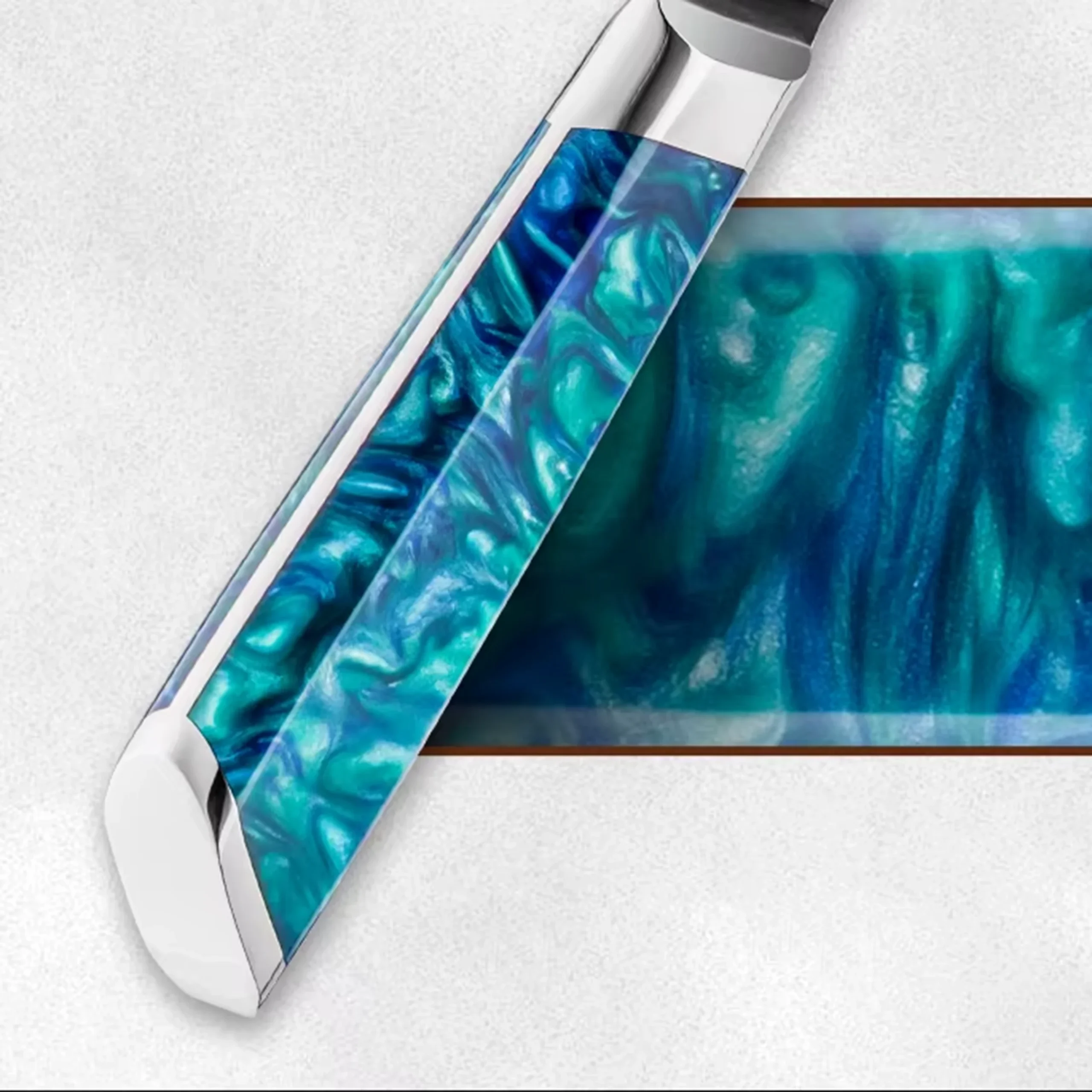 Close-up of ocean blue green resin knife handle isolated on white background. SKU: KL-KA-DS-003