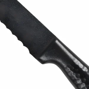 Black Bread Knife Handle Detail | KaiLionCrafts Close up of hammered dimple textured handle and non-stick bolster transition isolated on white background KL-KN-SS-007