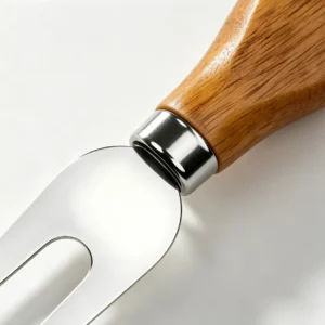 Polished 2-tine stainless steel cheese fork with ergonomic wood handle isolated on white background, KL-KA-GAD-007.