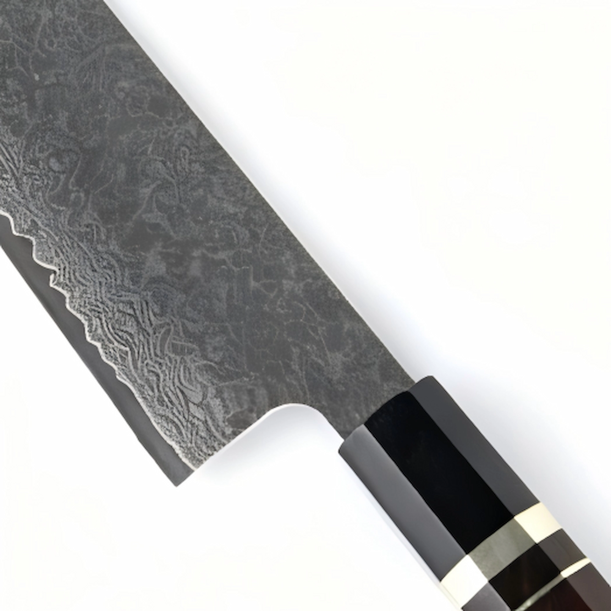 amascus steel chef knife blade close up featuring acid etched wave pattern isolated on white background KK-ER-004