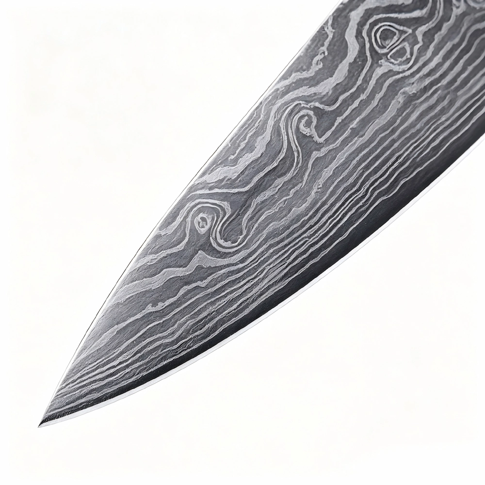 Close up view of the acid etched Damascus steel chef knife blade tip isolated on white background KL-KN-DS-020