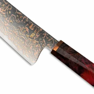 Crimson stabilized resin burl handle and copper etched blade close up on Damascus kiritsuke knife isolated on white background KL-KK-CS-029