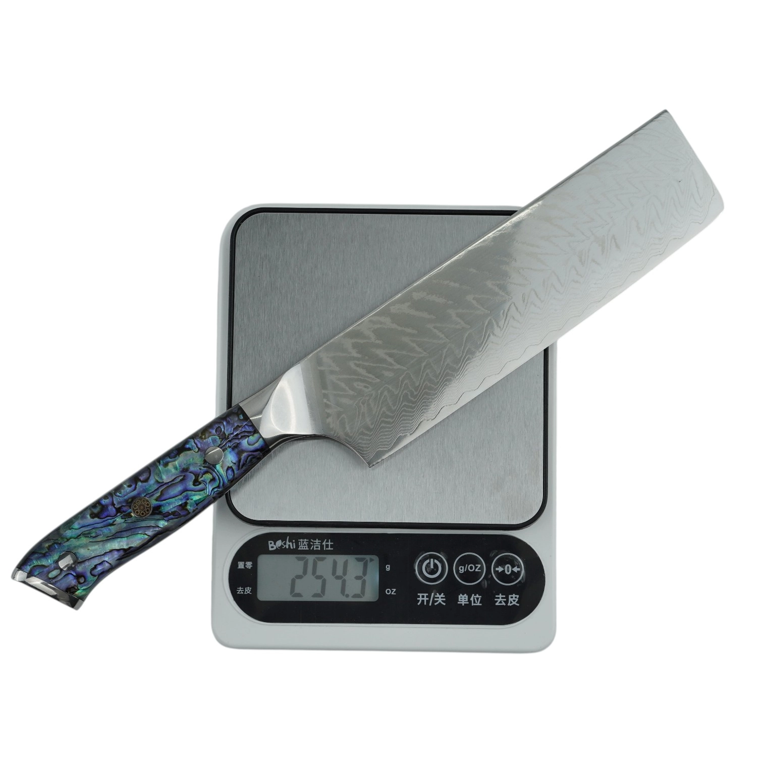 Weighing a Damascus nakiri vegetable knife on a digital scale, isolated on white background. KL-KN-DS-001-22