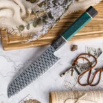 Damascus santoku knife with green honeycomb handle on wooden cutting board and marble workbench KL-KK-CS-028