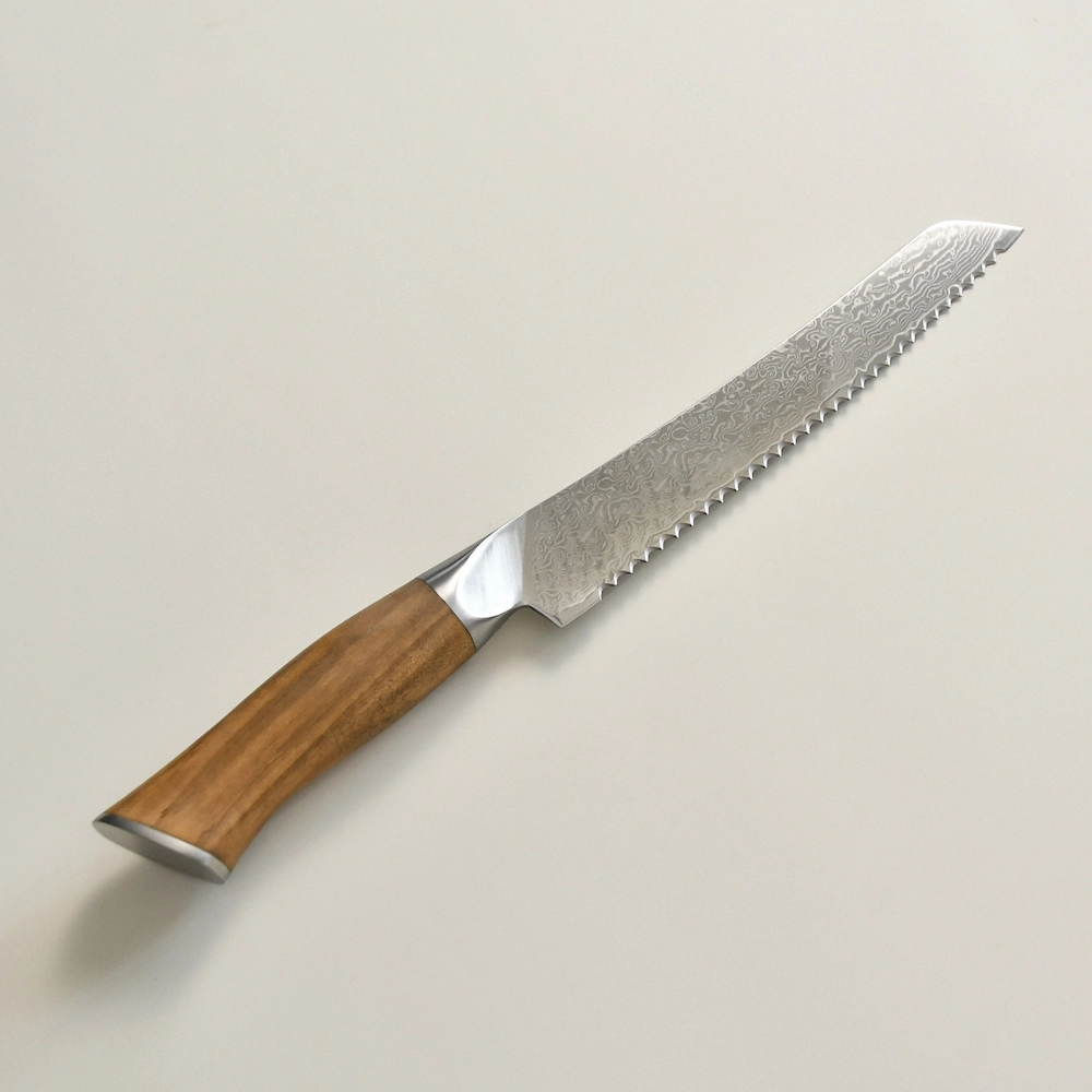 Damascus serrated bread knife with natural olive wood handle side view isolated on white background KL-KN-DS-022