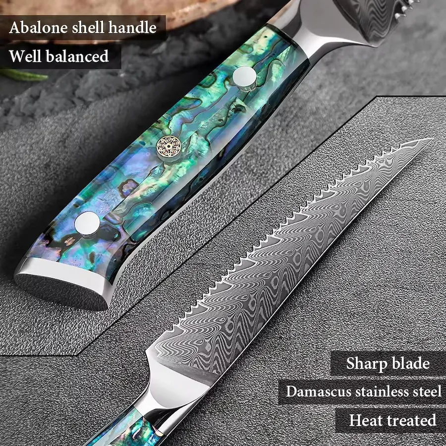 Damascus serrated steak knife with abalone shell handle on workbench setting KL-KN-OS-003