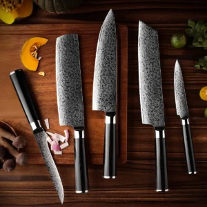 5-piece Damascus steel kitchen knife set displayed on wooden tabletop with cutting board. SKU: KK-DS-006