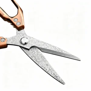 Close-up of semi-opened Damascus stainless steel kitchen shears blades with rose gold handles isolated on white background KL-SC-KT-001
