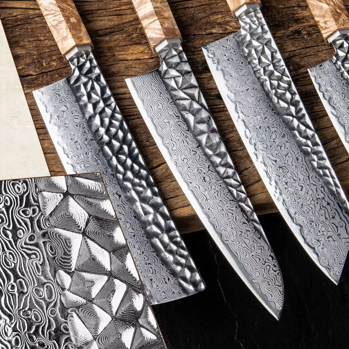Detailed close-up of Damascus steel kitchen knife blades with a hammered textured finish on workbench setting. SKU: KL-KK-DS-004