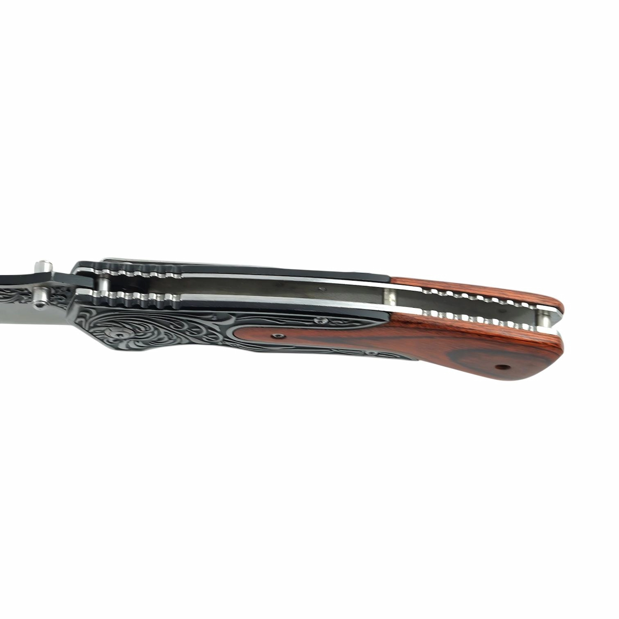 Engraved Folding Pocket Knife - Handle Spine and Liner Construction | KaiLionCrafts Close-up view of the handle spine and internal lining of an engraved folding knife, isolated on white background. KL-OD-SS-018