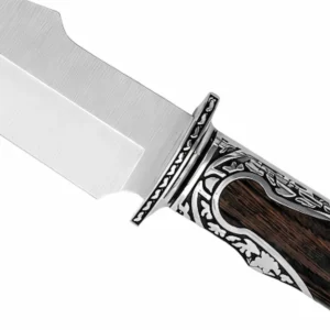 45 degree close up view of hunting knife engraved guard and rosewood handle on white background KL-OD-HC-002