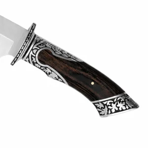 Ornate engraved metal bolster and rosewood handle close up view isolated on white background KL-OD-HC-002