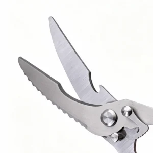 Close-up of serrated stainless steel fishing scissors blades isolated on white background KL-SC-SS-011