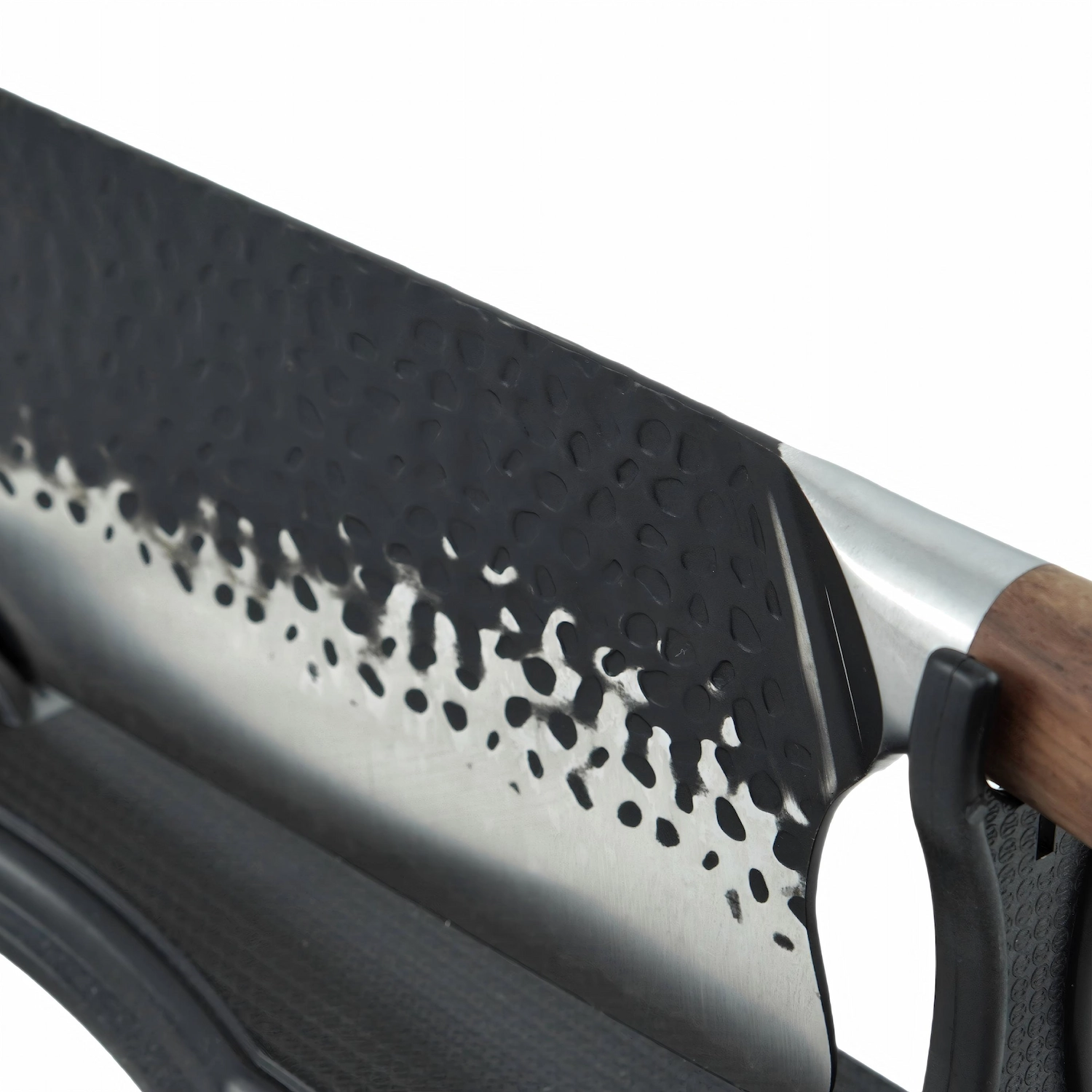 Black hammered cleaver knife resting on a black display stand isolated on white background KL-KN-HM-005