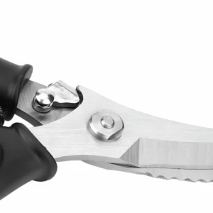 Close-up of safety lock latch and pivot joint on heavy-duty poultry shears isolated on white background, SKU KL-SC-SS-004.