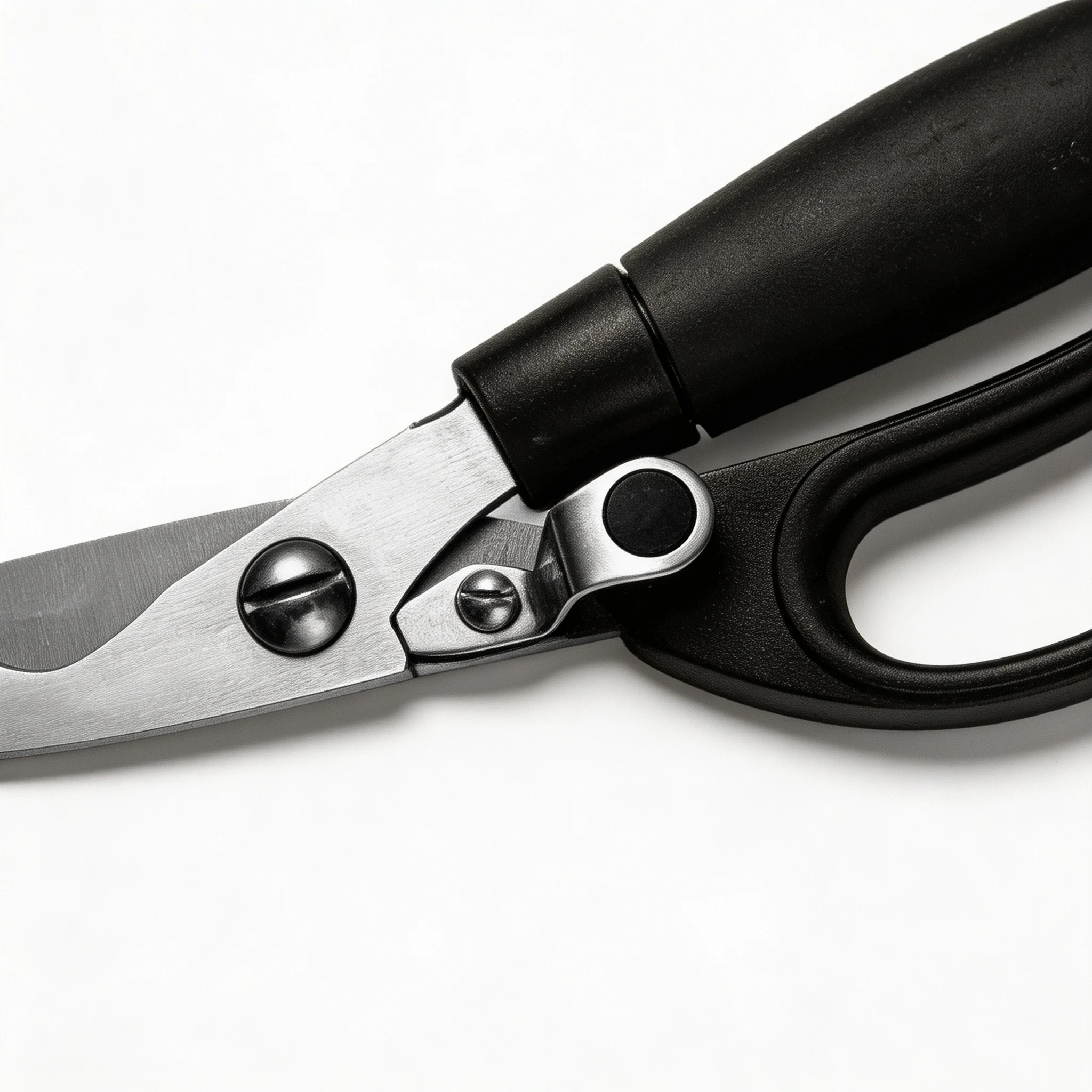 Close up of ergonomic black handle and pivot mechanism on kitchen scissors isolated on white background KL-SC-KT-002