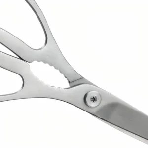 Detailed close-up of all-metal integrated handle and center nutcracker of kitchen scissors isolated on white background KL-SC-SS-007.