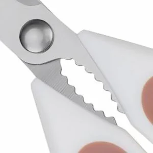 Close-up of serrated steel center grips on kitchen scissors isolated on white background KL-SC-SS-005.