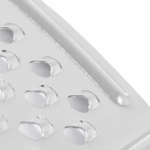 Extreme close up view of micro hole perforation details on stainless steel zester grater isolated on white background KL-KA-GR-004