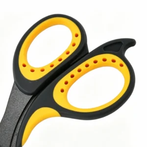 Close-up of yellow and black dual-color soft grip ergonomic handles on office scissors isolated on white background KL-SC-TI-002