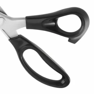 Close-up of pinking shears ergonomic black plastic handle isolated on white background, SKU KL-SC-PR-001