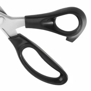 Close-up of pinking shears ergonomic black plastic handle isolated on white background, SKU KL-SC-PR-001