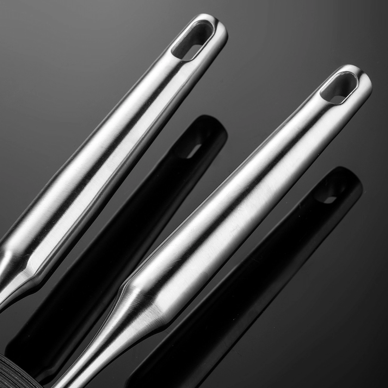 Stainless steel potato masher handle close up showing integrated hanging loop KL-KA-GAD-001