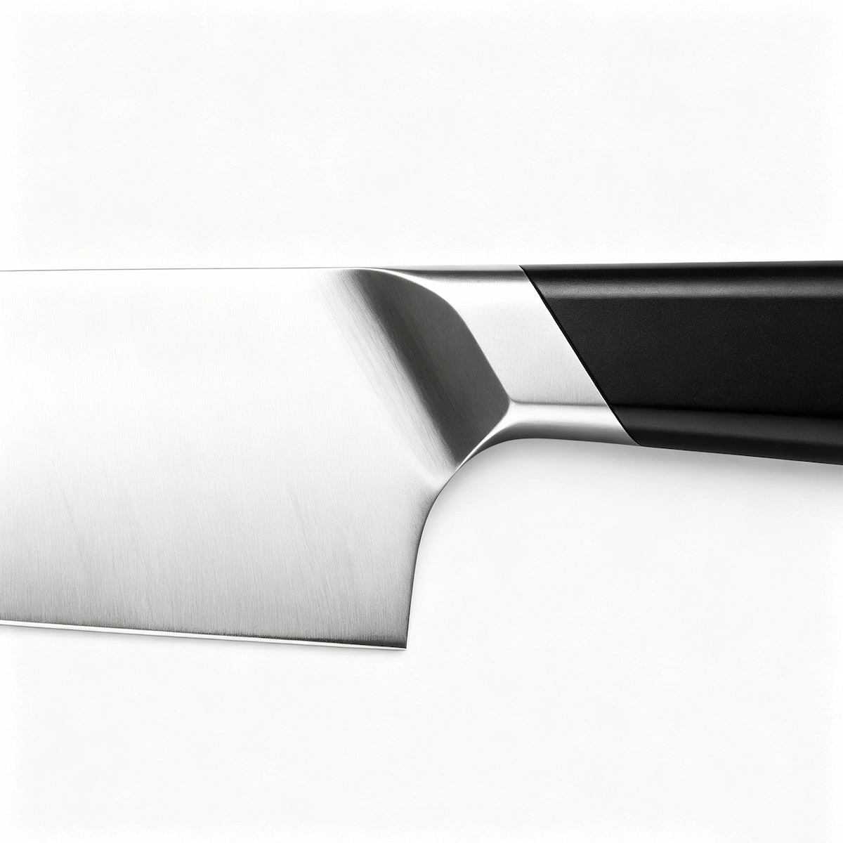 Professional Chef Knife Bolster Detail | KaiLionCrafts Close up of professional chef knife stainless steel bolster and heel transition on white background KL-KN-SS-022