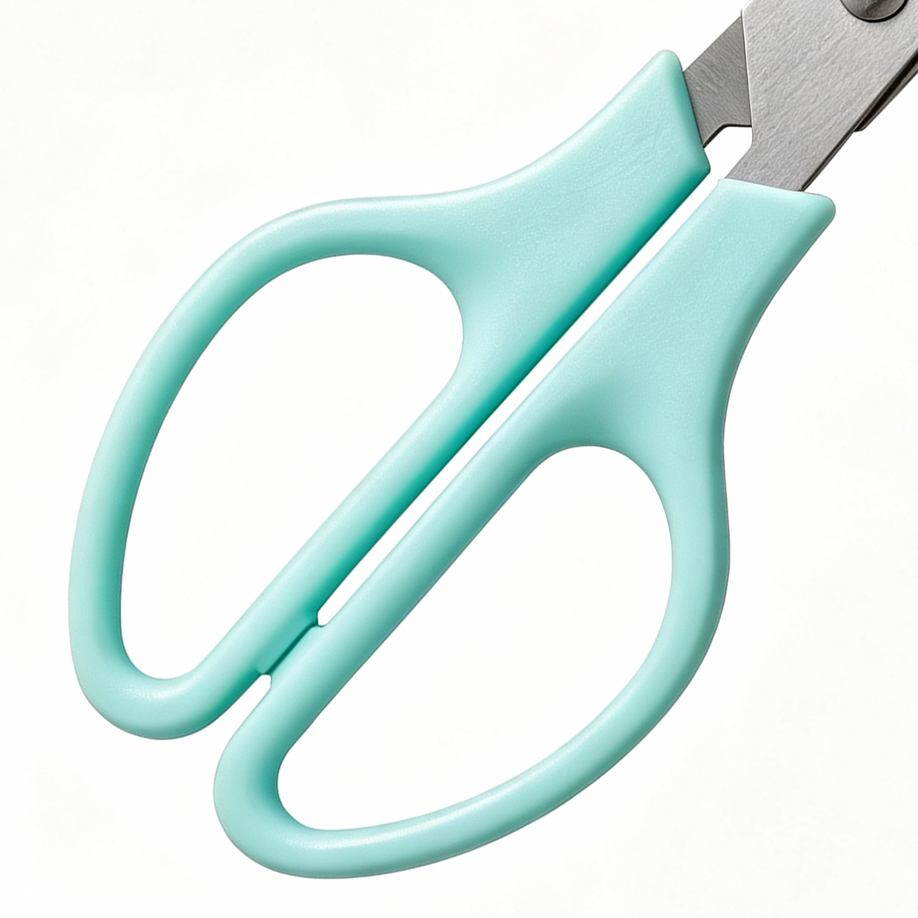 Detailed view of mint teal ergonomic loop handles on quail egg scissors isolated on white background KL-SC-KT-004