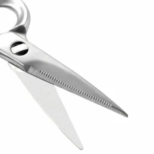 Serrated stainless steel kitchen scissors blade detail isolated on white background KL-SC-PR-008