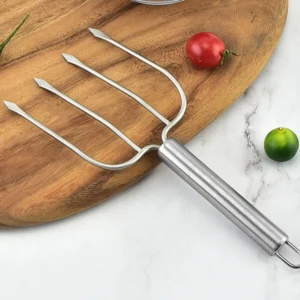 Stainless steel 4-prong turkey meat fork displayed on wooden tabletop KL-KA-BBQ-006
