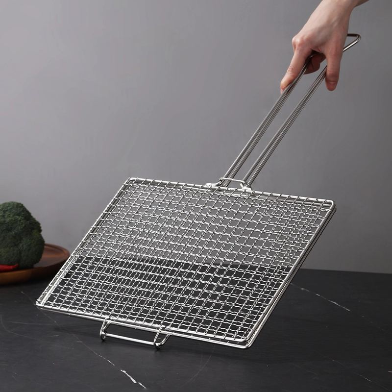 Stainless steel square BBQ grill basket held in hand for scale on workbench setting KL-KA-BBQ-005