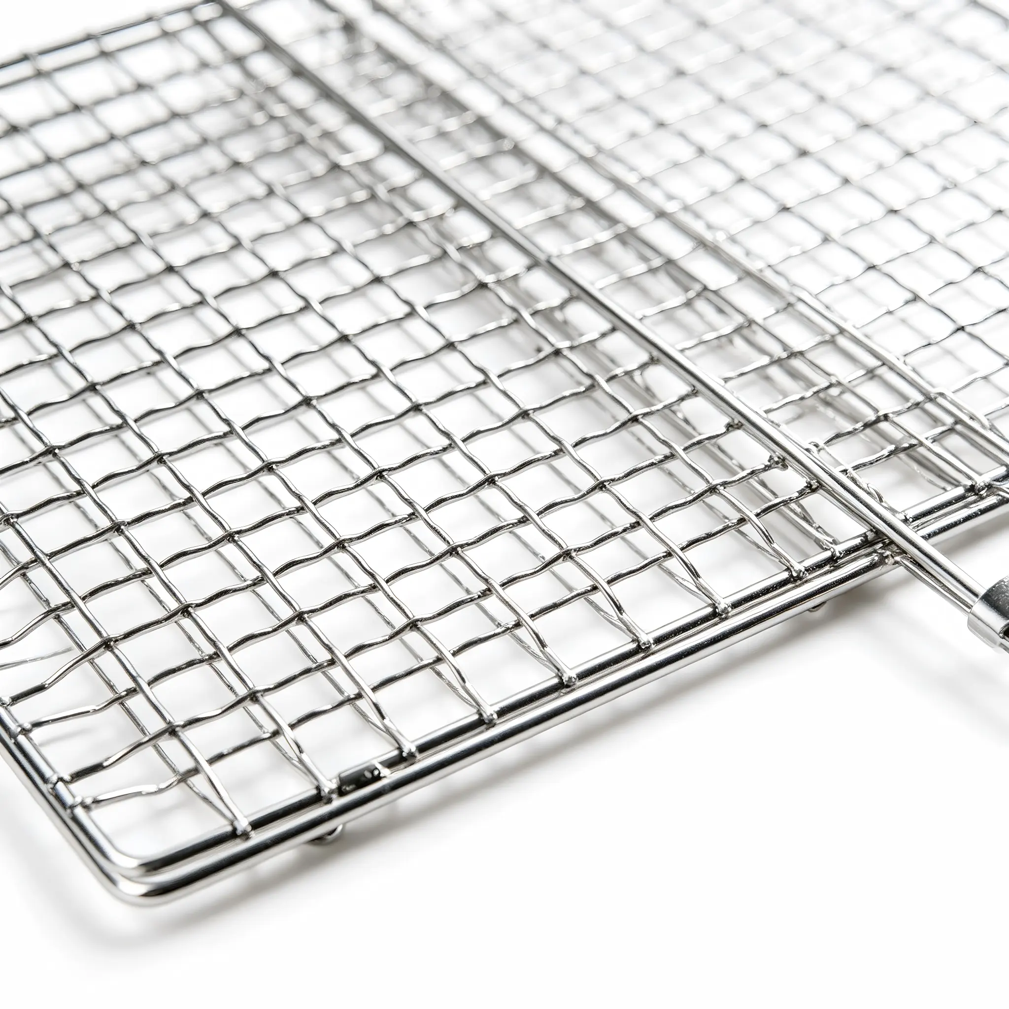Close up of polished chrome wire mesh grid on a stainless steel BBQ grill basket isolated on white background KL-KA-BBQ-010