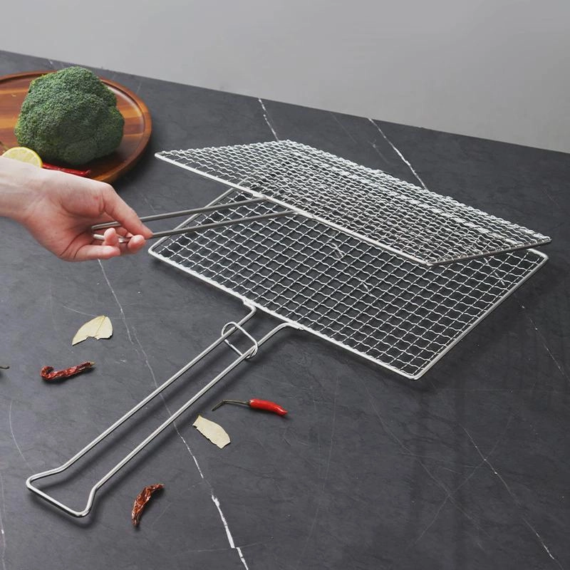 Stainless steel square BBQ grill basket shown partially open on workbench setting KL-KA-BBQ-005