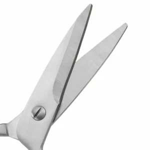 Detailed close-up of sharp stainless steel kitchen scissors blade on white background KL-SC-PR-010