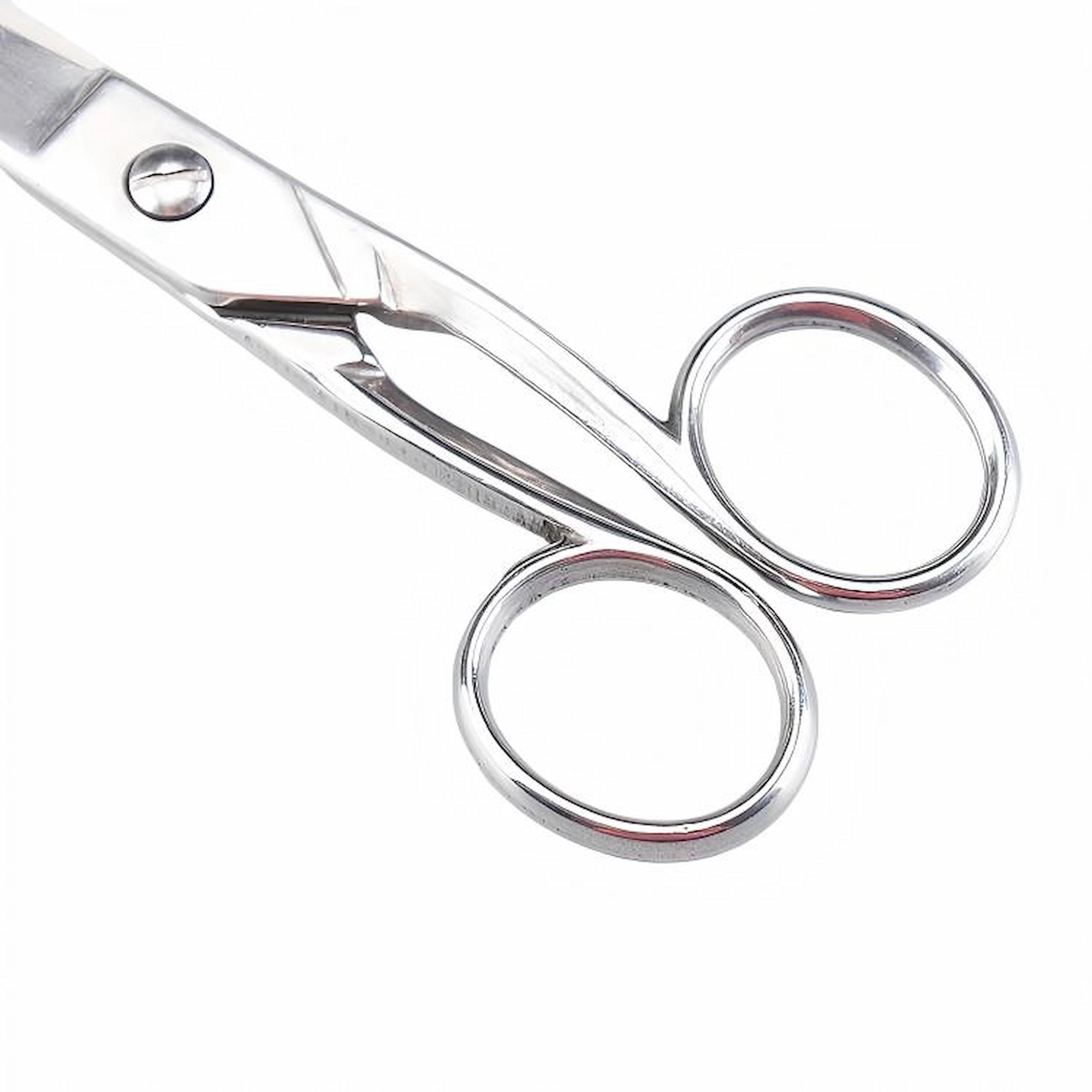 A detailed close-up of the mirror polished ergonomic finger loops on classic barber scissors, SKU: KL-SC-HC-002.