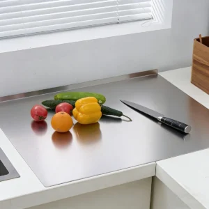 Stainless steel pastry board with knife and vegetables in kitchen environment KL-KA-CB-003