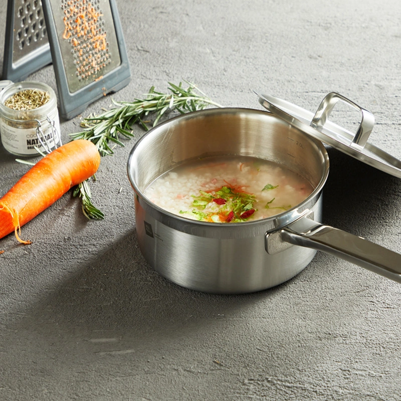 stainless-steel-saucepan-cooking-porridge-in-use-kl-ka-cu-002.webp