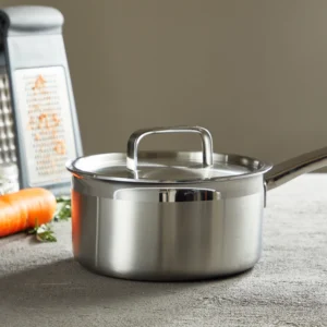 Stainless steel saucepan with lid and long handle on workbench setting KL-KA-CU-002