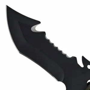 Close-up of black oxide tactical tanto knife blade with serrated spine isolated on white background. SKU: KL-OD-TI-007