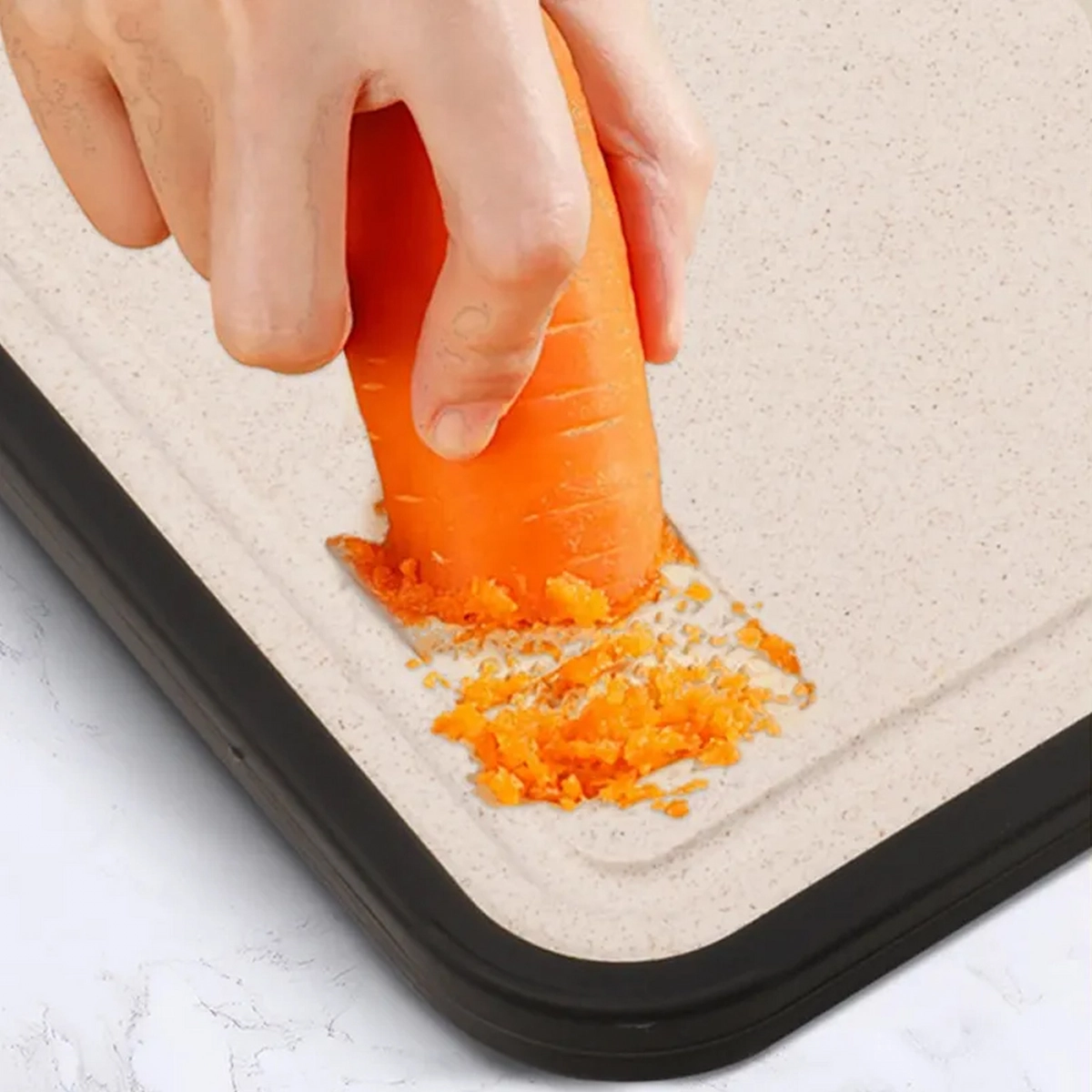 Wheat straw cutting board with built-in ginger garlic grater feature on workbench setting KL-KA-CB-002