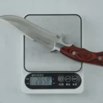 eighing a fixed blade hunting knife with a wood handle on a digital scale. KL-OD-HC-001-36